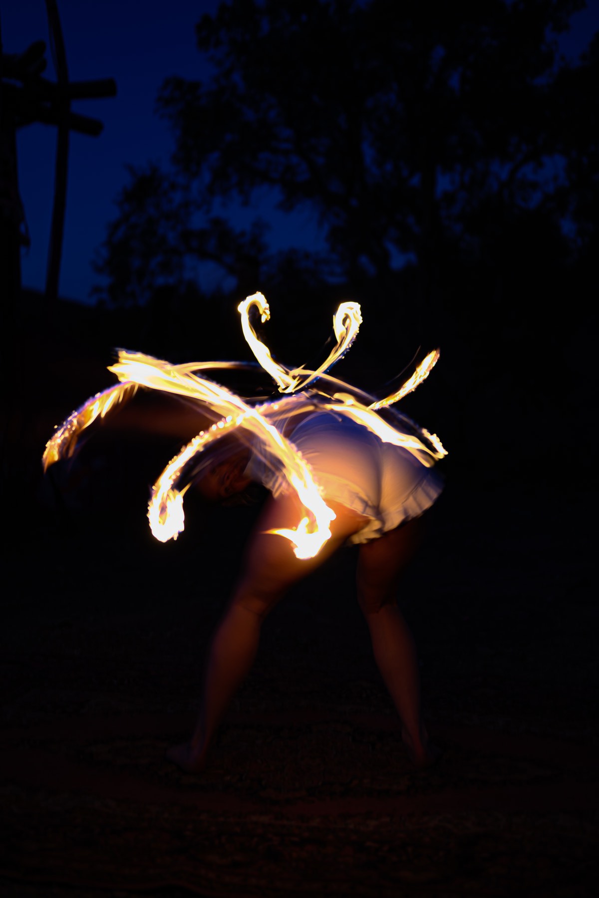 A loop of flame around a dancer.
