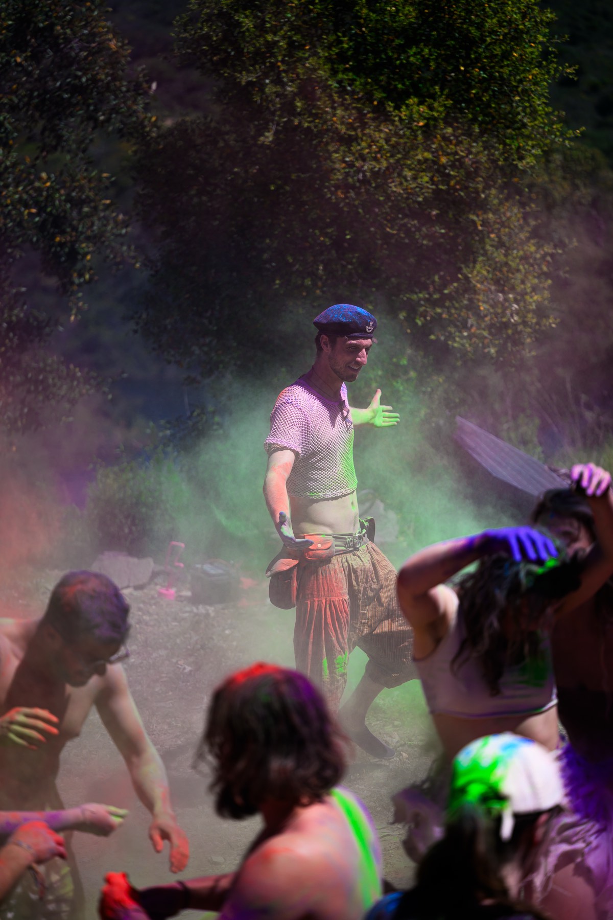 Walking out of the green and purple dust.